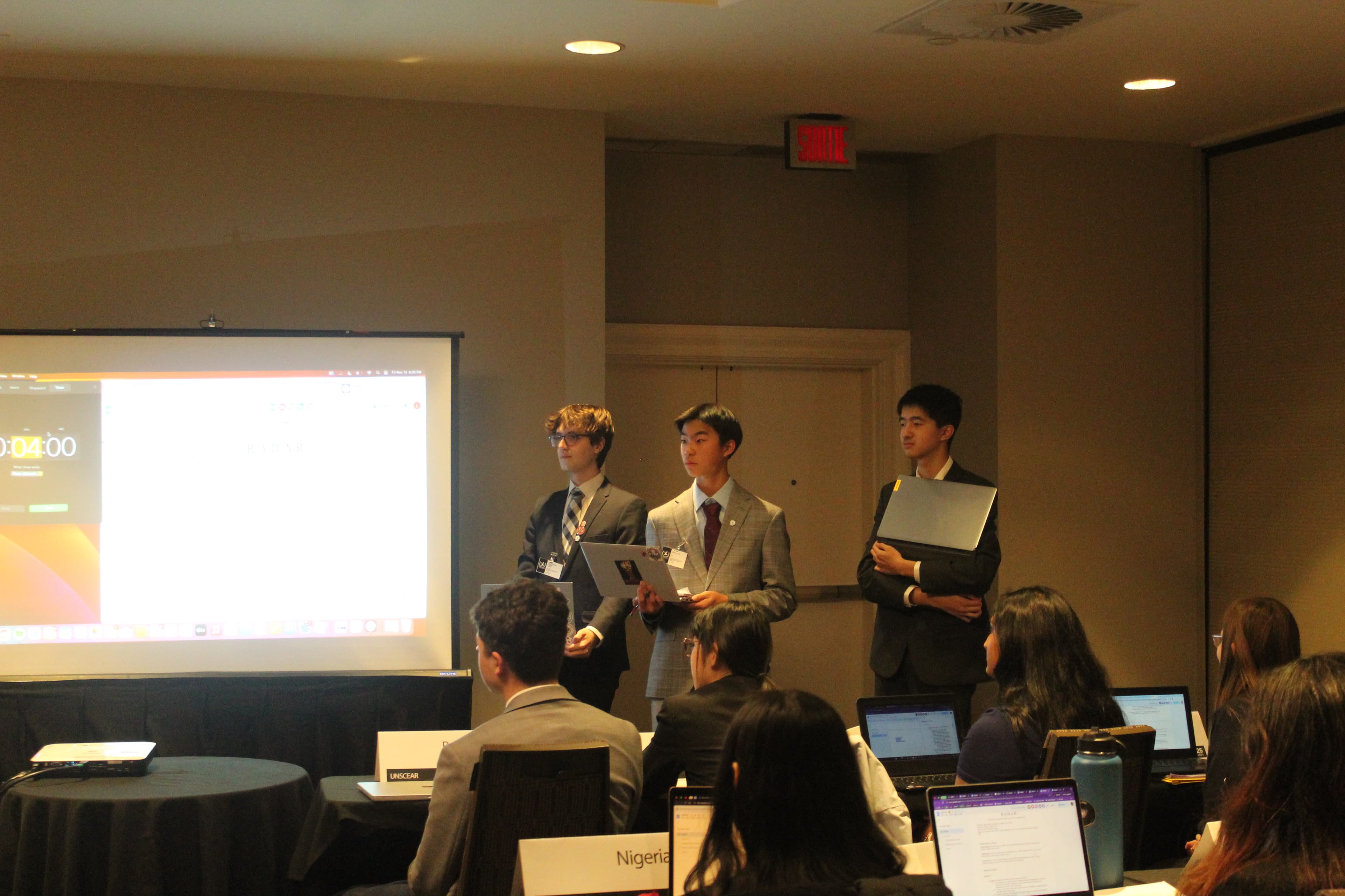 Delegates debating during session